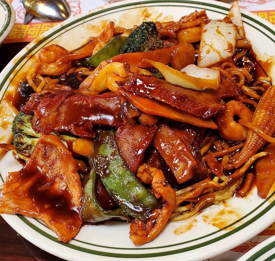Chinese restaurant interior with simple seating.