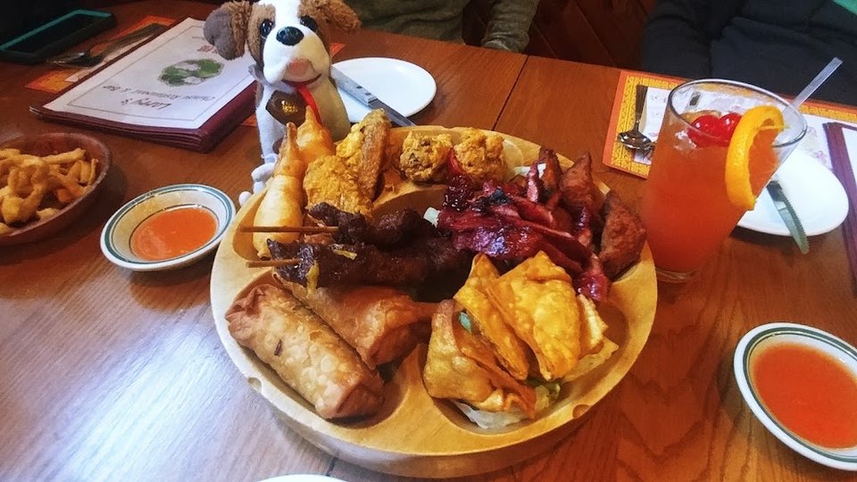 Charlie Checking Out the Pu Pu Platter